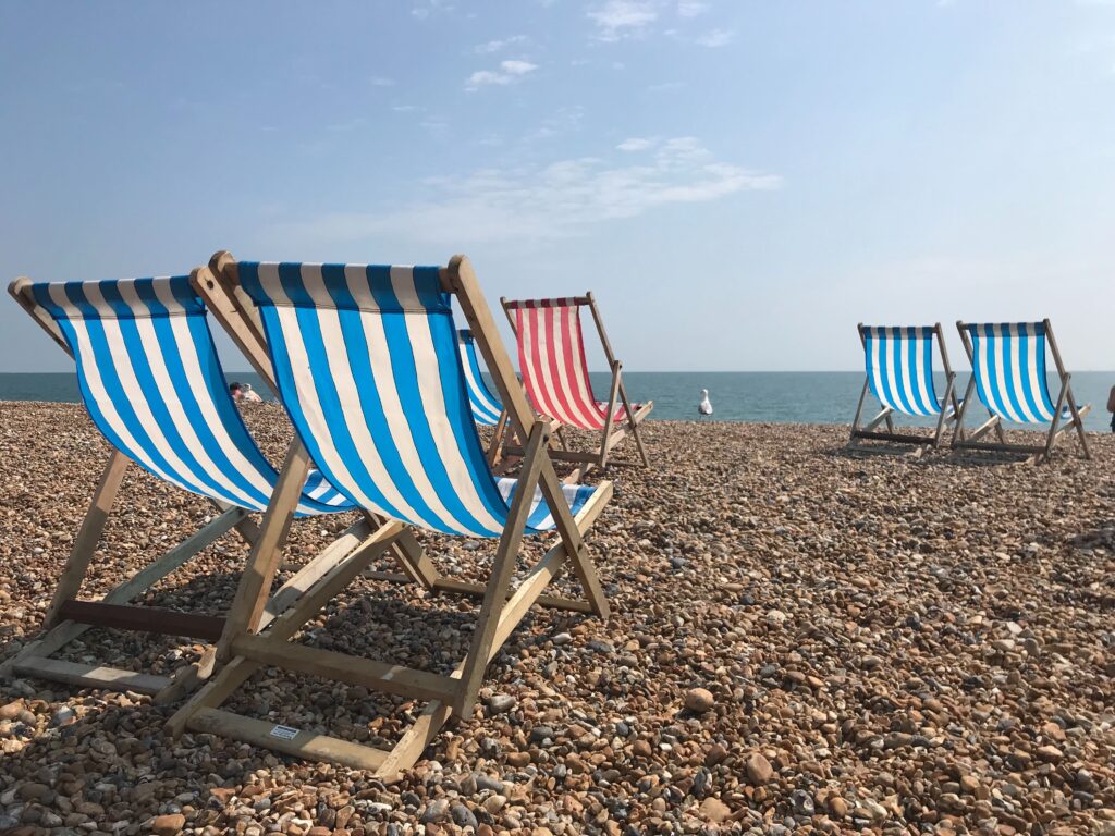 Deckchairs on Hythe beach holidays